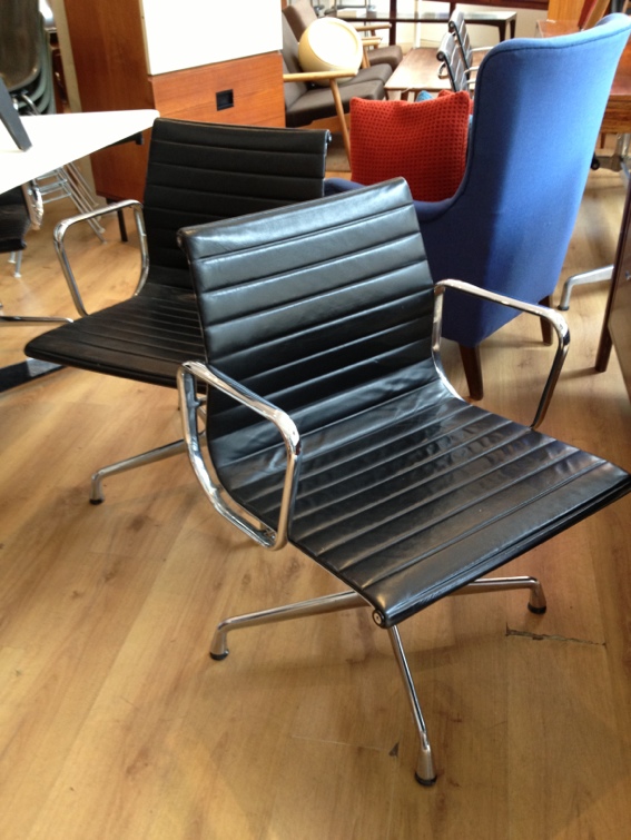 10 leather Eames Chairs